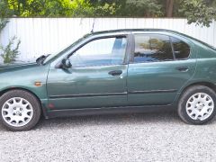 Photo of the vehicle Nissan Primera