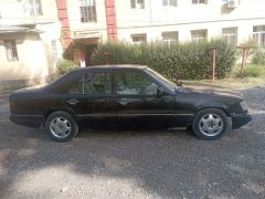 Сүрөт унаа Mercedes-Benz W124