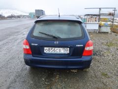 Photo of the vehicle Mazda 323