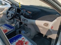 Сүрөт унаа Nissan Almera Tino