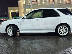 Photo of the vehicle Subaru Impreza WRX