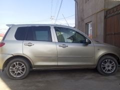 Сүрөт унаа Mazda Demio