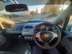 Фото авто Honda Fit