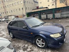 Photo of the vehicle Mazda 323