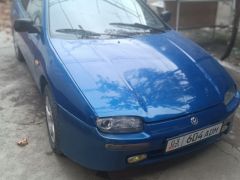 Фото авто Mazda 323