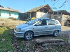 Фото авто Nissan Almera Tino