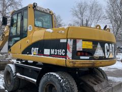 Фото авто Caterpillar M315