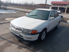 Фото авто Mitsubishi Lancer