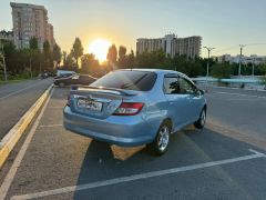 Photo of the vehicle Honda Fit Aria