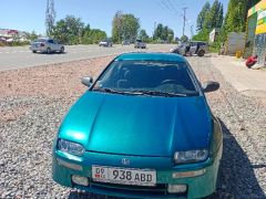 Сүрөт унаа Mazda 323