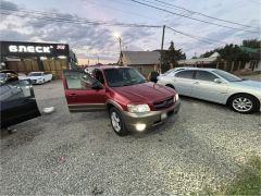 Photo of the vehicle Mazda Tribute