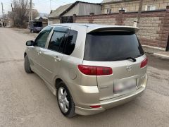 Сүрөт унаа Mazda Demio