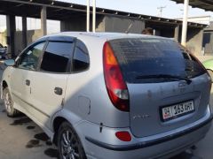 Фото авто Nissan Almera Tino