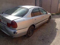 Сүрөт унаа Mitsubishi Carisma