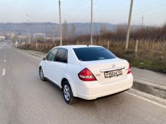 Фото авто Nissan Tiida