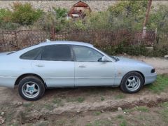 Photo of the vehicle Mazda Cronos