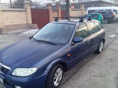 Сүрөт унаа Mazda 323