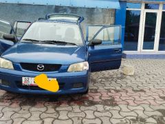 Сүрөт унаа Mazda Demio