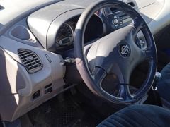 Сүрөт унаа Nissan Almera Tino