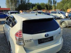 Photo of the vehicle Toyota Prius v (+)