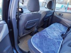 Сүрөт унаа Nissan Almera Tino