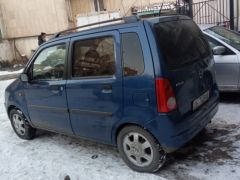 Сүрөт унаа Opel Agila