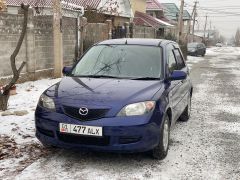 Фото авто Mazda Demio