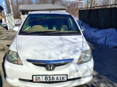 Фото авто Honda Fit Aria