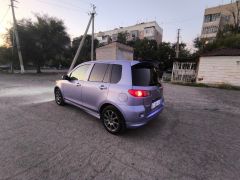 Photo of the vehicle Mazda Demio