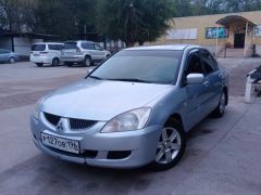 Фото авто Mitsubishi Lancer