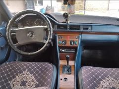 Сүрөт унаа Mercedes-Benz W124