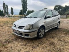 Фото авто Nissan Almera Tino