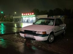 Photo of the vehicle Mazda 323