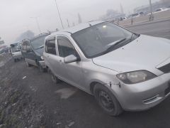 Photo of the vehicle Mazda Demio