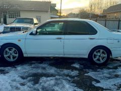 Фото авто Nissan Bluebird