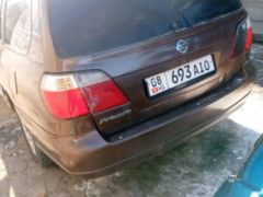 Photo of the vehicle Nissan Primera