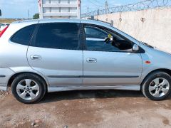 Photo of the vehicle Nissan Almera Tino