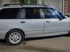 Photo of the vehicle Nissan Primera