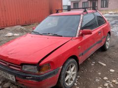 Сүрөт унаа Mazda 323