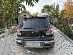 Сүрөт унаа Mitsubishi Outlander