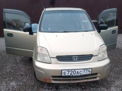 Фото авто Honda Capa