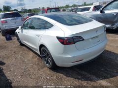 Photo of the vehicle Tesla Model 3