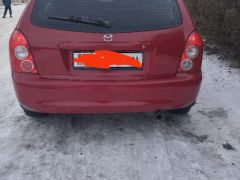 Photo of the vehicle Mazda 323