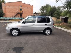 Сүрөт унаа Mazda Demio