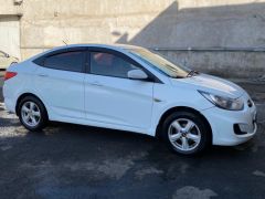 Фото авто Hyundai Solaris