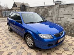 Photo of the vehicle Mazda 323