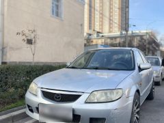 Фото авто Mazda 323