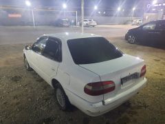 Сүрөт унаа Toyota Corolla