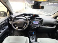 Сүрөт унаа Toyota Prius c