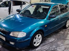 Фото авто Mazda 323